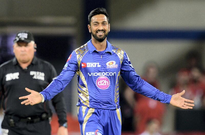 Mumbai Indians cricketer Krunal Pandya celebrates after taking the wicket of Kings XI Punjab batsman Wriddhiman Saha during the 2017 Indian Premier League (IPL) Twenty20 cricket match between Kings XI Punjab and Mumbai Indians at The Holkar Cricket Stadium in Indore on April 20, 2017. ------IMAGE RESTRICTED TO EDITORIAL USE - STRICTLY NO COMMERCIAL USE----- / GETTYOUT------ (Photo by PUNIT PARANJPE / AFP) / ----IMAGE RESTRICTED TO EDITORIAL USE - STRICTLY NO COMMERCIAL USE----- / GETTYOUT