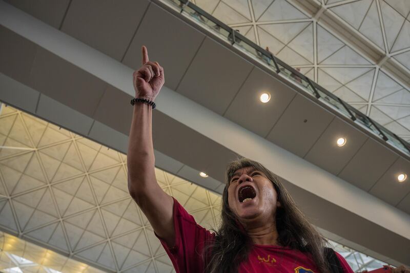 Former Hong Kong lawmaker and pro-democracy activist Leung Kwok-hung, also known as 'Long Hair', shouts at the rally. Getty Images)