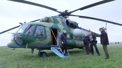 Russian President Vladimir Putin lands in the Kherson region of Ukraine to visit troops on Tuesday. EPA