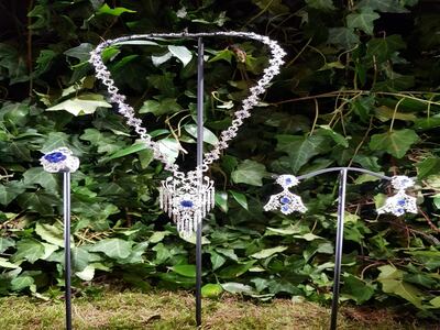 A waterfall effect necklace in white diamonds and blue sapphires. Sarah Maisey / The National