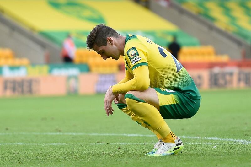 Kenny McLean - 6: Thought he had scored with a wonderful free kick only to see Martinez fling himself across goal to palm out for a corner. EPA