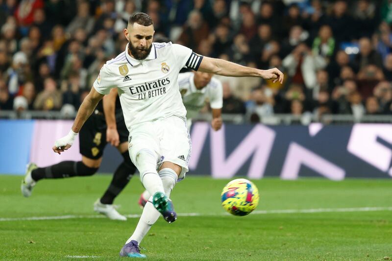 Real Madrid's striker Karim Benzema scores from the penalty spot to make it 2-0. AP Photo