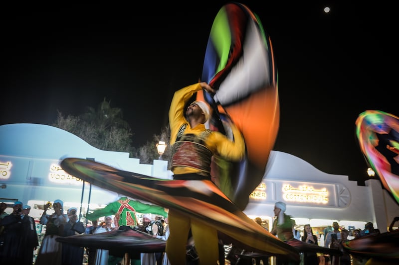 A dancer performs the 'Tanoura' during a street performance in Sharm El Sheikh. EPA
