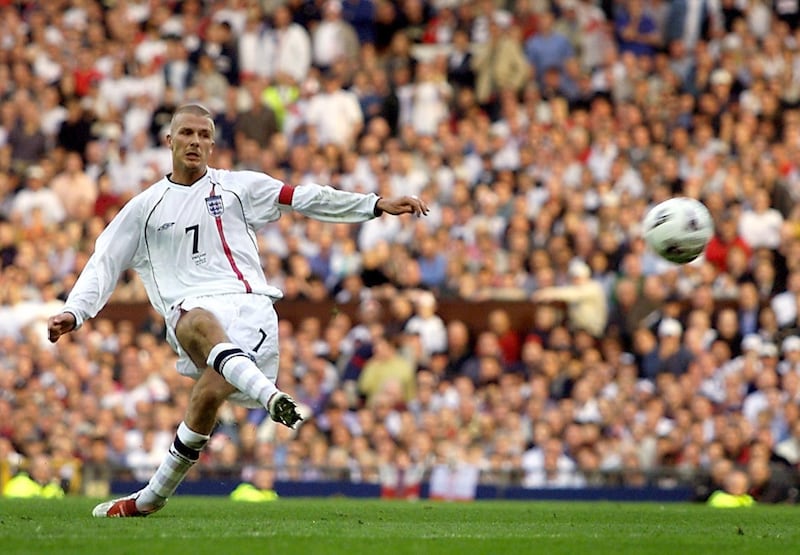 England's David Beckham scores from a free kick to equalise against
Greece in their World Cup Group Nine qualifying match at Old Trafford,
Manchester October 6, 2001. The final score was 2-2 and England
qualifies for the World Cup finals of 2002 in South Korea and Japan.
REUTERS/Darren Staples

DS/NMB