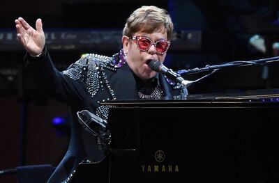 epa08050893 British musician Elton John (L) performs on stage during A Day On The Green music festival at Mt Duneed Estate in Geelong, Australia, 07 December 2019.  EPA/JULIAN SMITH AUSTRALIA AND NEW ZEALAND OUT