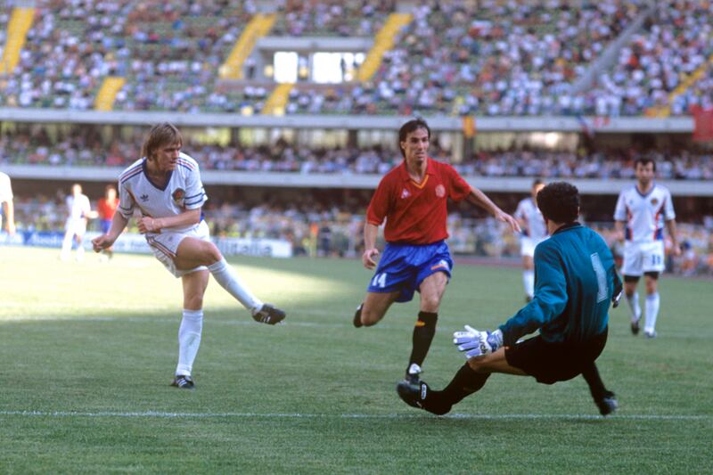 Yugoslavia's Dragan Stojkovic slots the ball past Spain goalkeeper Andoni Zubizarreta at the 1990 World Cup in Italy.