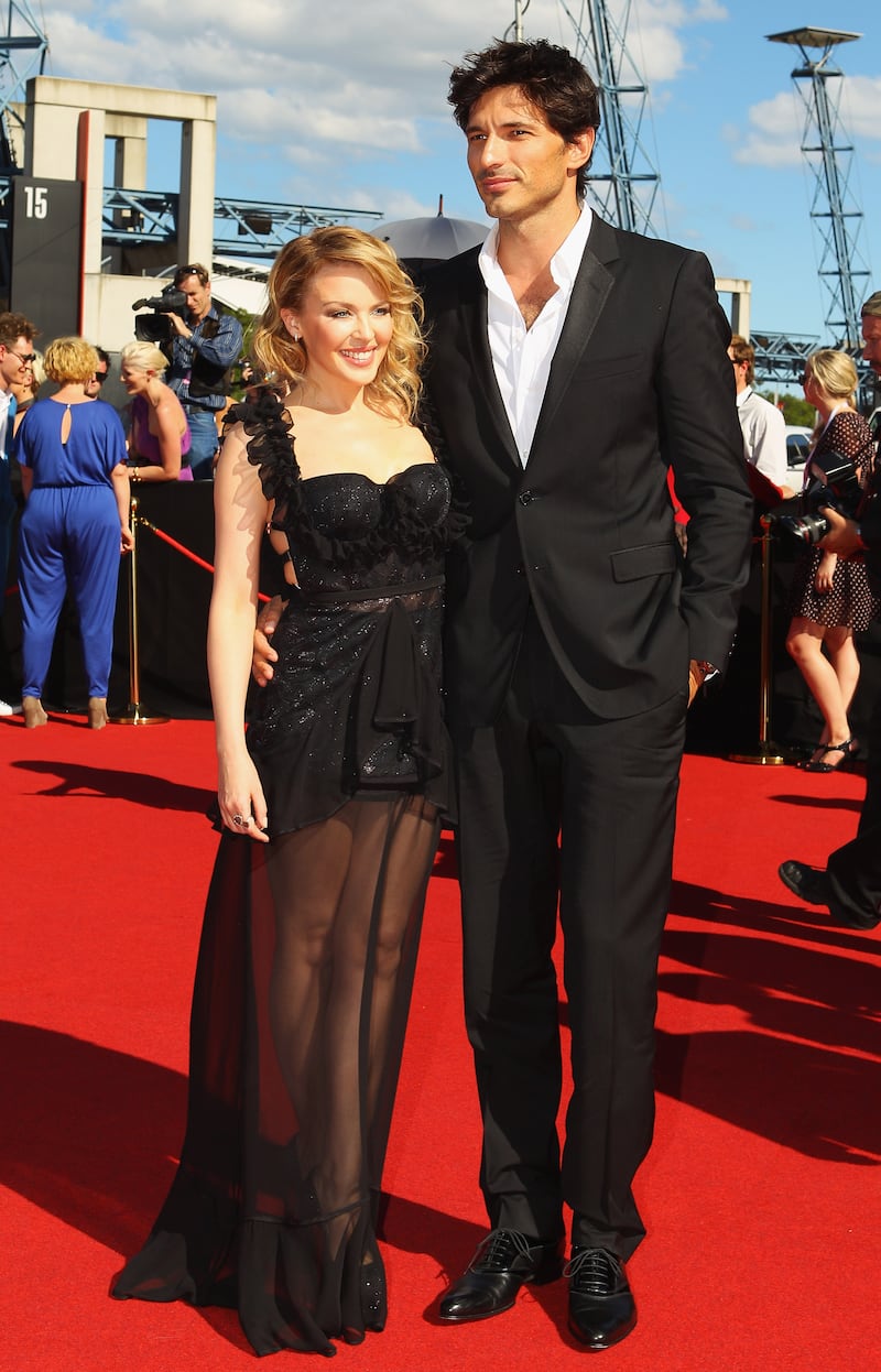 Kylie Minogue, in Richard Nicoll, and Andres Velencoso attend the Aria Awards at the Allphones Arena on November 27, 2011 in Sydney, Australia.