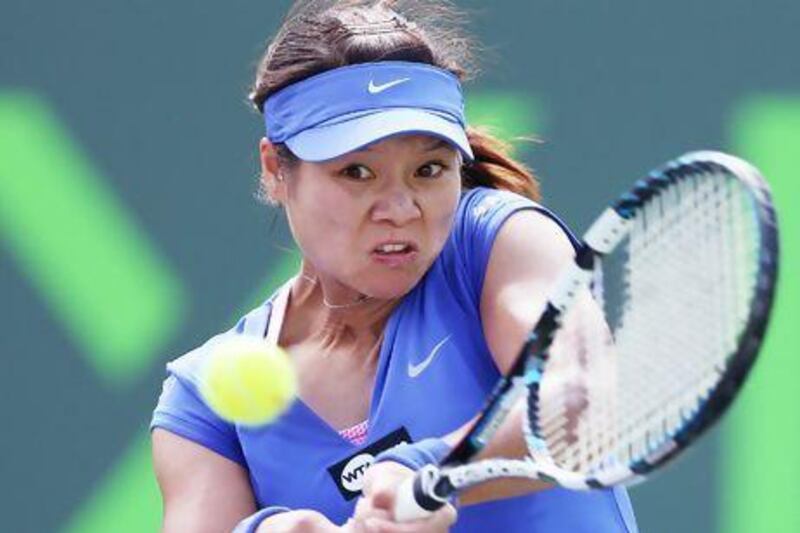 Li Na is among the most popular sports figures in China where 116 million people watched her win the French Open title. Clive Brunskill / Getty Images