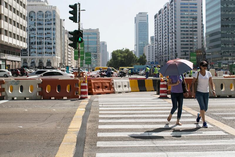 Abu Dhabi, United Arab Emirates. May 9, 2017///

This is the newly painted zebra crossing. People jaywalking / running across the road in front of Abu Dhabi Mall after the pedestrian bridge have been removed. Abu Dhabi, United Arab Emirates. Mona Al Marzooqi/ The National 

ID: 50055
Reporter: Anwar HajiKaram
Section: National  *** Local Caption ***  170509-MM-crossing-003.JPG