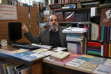 Former revolutionary and bookseller Mohsen Fat'hi talks about Iran's 1979 Islamic Revolution, in downtown Tehran, January 23, 2019. AP