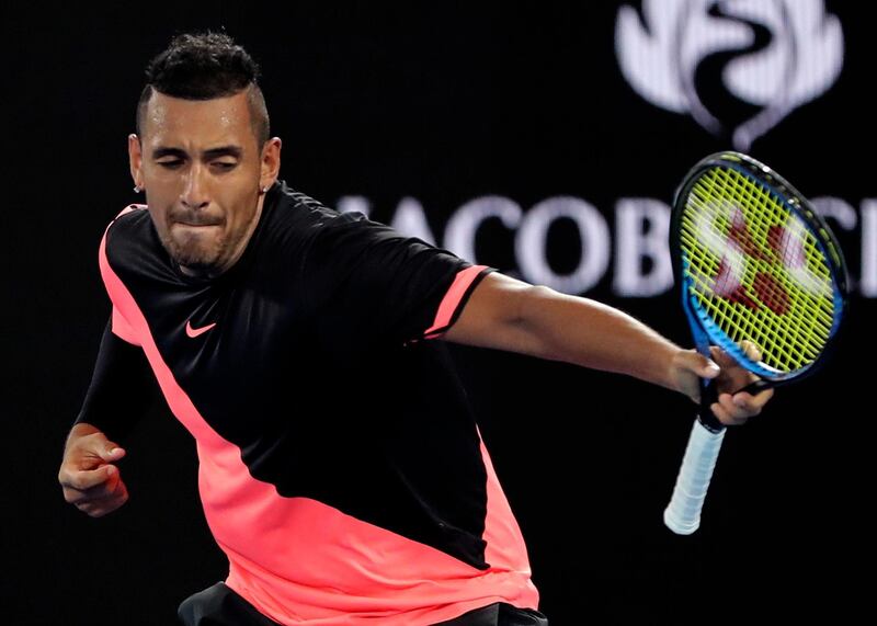 Australia's Nick Kyrgios celebrates after defeating France's Jo-Wilfried Tsonga during his third round match at the Australian Open tennis championships in Melbourne, Australia, Friday, Jan. 19, 2018. (AP Photo/Dita Alangkara)