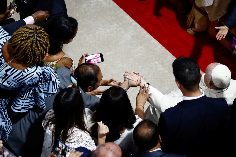 Pope Francis arrives for a meeting and an Angelus prayer with bishops, priests, seminarians and pastoral workers at Manama's Sacred Heart Church. Reuters