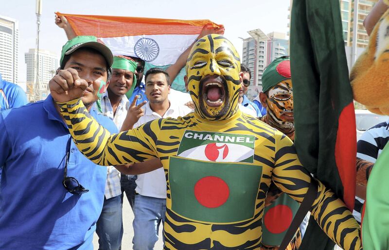 DUBAI , UNITED ARAB EMIRATES, September 28 , 2018 :- Supporters of India and Bangladesh arriving to watch the final of Unimoni Asia Cup UAE 2018 cricket match between Bangladesh vs India held at Dubai International Cricket Stadium in Dubai. ( Pawan Singh / The National )  For News/Sports/Instagram/Big Picture. Story by Paul