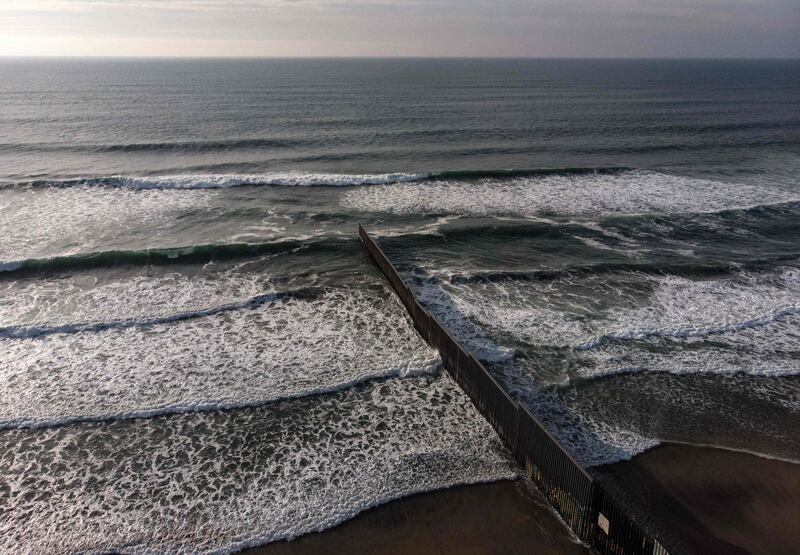 Aerial view of the US-Mexico border fence seen from Playas de Tijuana, Baja California state. AFP