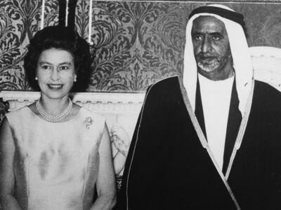 Queen Elizabeth II and Sheikh Rashid bin Saeed Al Maktoum, Ruler of Dubai, at a luncheon at Buckingham Palace, London, July 22, 1969. Getty Images