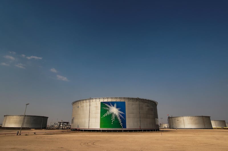FILE PHOTO: A view shows branded oil tanks at Saudi Aramco oil facility in Abqaiq, Saudi Arabia October 12, 2019. REUTERS/Maxim Shemetov/File Photo