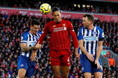 Soccer Football - Premier League - Liverpool v Brighton & Hove Albion - Anfield, Liverpool, Britain - November 30, 2019 Liverpool's Virgil van Dijk scores their second goal Action Images via Reuters/Jason Cairnduff EDITORIAL USE ONLY. No use with unauthorized audio, video, data, fixture lists, club/league logos or "live" services. Online in-match use limited to 75 images, no video emulation. No use in betting, games or single club/league/player publications. Please contact your account representative for further details.