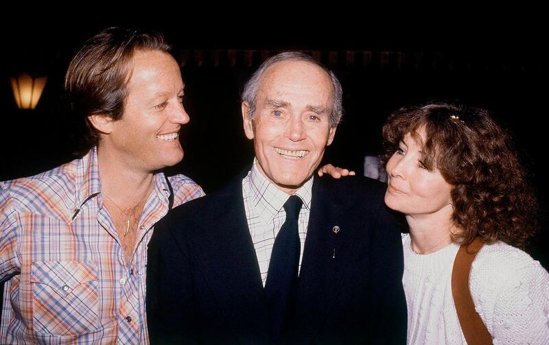 Henry Fonda, centre, attends his 75th birthday with son Peter Fonda, left, and his wife, Shirlee Fonda on May 16, 1980. AP.