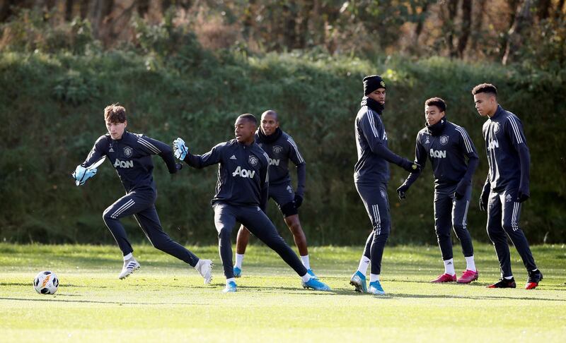 Soccer Football - Europa League - Manchester United Training - Aon Training Complex, Manchester, Britain - October 23, 2019   Manchester United's Marcus Rashford, Ashley Young, Jesse Lingard and Mason Greenwood with team mates during training   Action Images via Reuters/Jason Cairnduff