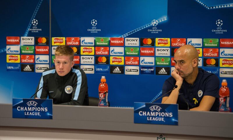 epa06643426 Pep Guardiola manager of Manchester City (R) with Kevin De Bruyne (L) during a press conference held at the Anfield in Liverpool, Britain, 03 April 2018. Manchester City FC will face Liverpool FC in the UEFA Champions League quarter final first leg soccer match held at Anfield, Manchester, Britain, 04 April 2018.  EPA/Peter Powell .