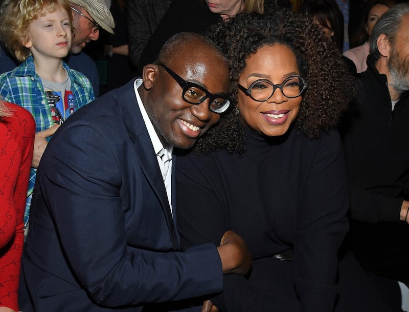 British Vogue editor-in-chief Edward Enninful and Oprah Winfrey attend the Stella McCartney show (Photo by Pascal Le Segretain/Getty Images)