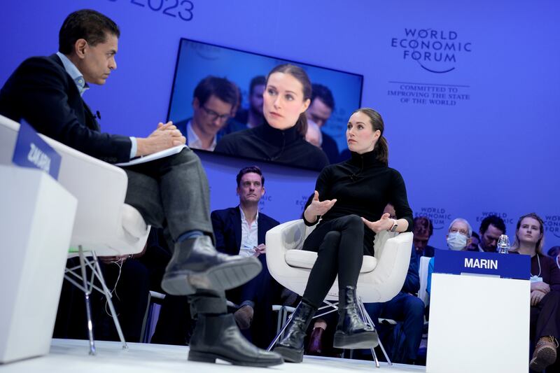 Finland's Prime Minister Sanna Marin, right, is interviewed by Fareed Zakaria in Davos. AP