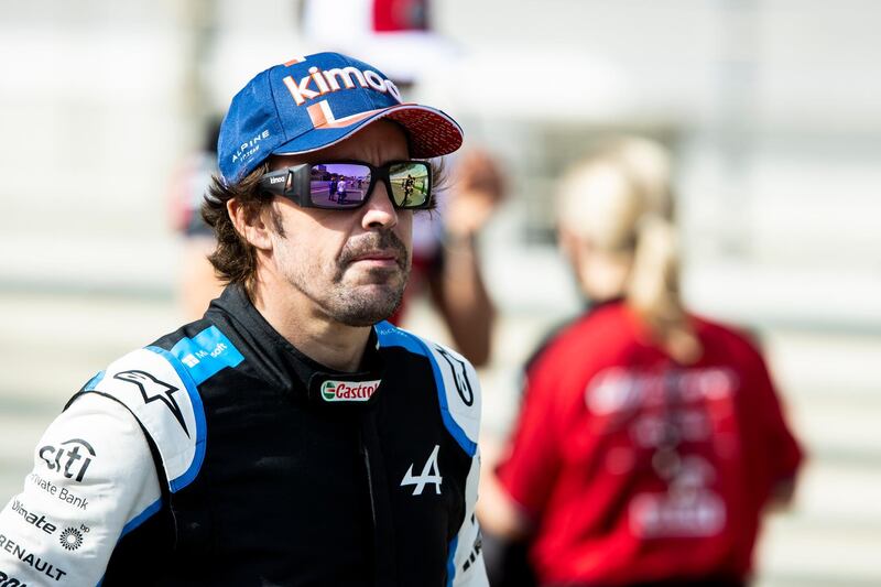 BAHRAIN, BAHRAIN - MARCH 12: Fernando Alonso of Spain and Alpine F1 Team looks on from the grid during Day One of F1 Testing at Bahrain International Circuit on March 12, 2021 in Bahrain, Bahrain. (Photo by Mark Thompson/Getty Images)