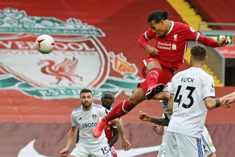 Liverpool defender Virgil van Dijk heads home Liverpool's second. AFP