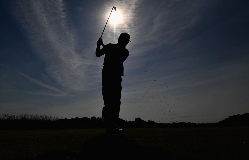 Haotong Li of China hits his tee shot on the 9th hole during a practice round prior to the 146th Open Championship at Royal Birkdale on July 18, 2017 in Southport, England. Dan Mullan/Getty Images