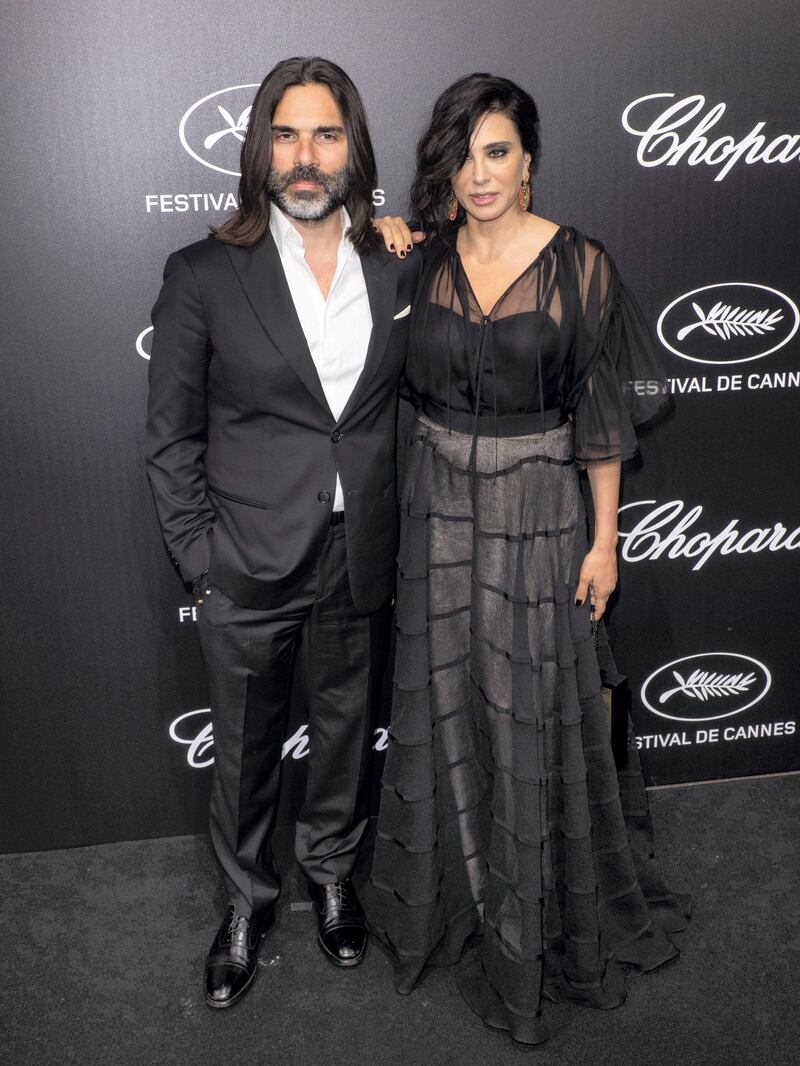 epa07588001 Khaled Mouzanar (L) and Nadine Labaki (R) attend the Trophee Chopard Dinner at the Agora during the 72nd annual Cannes Film Festival, in Cannes, France, 20 May 2019. The festival runs from 14 to 25 May.  EPA/JEROME ROUX
