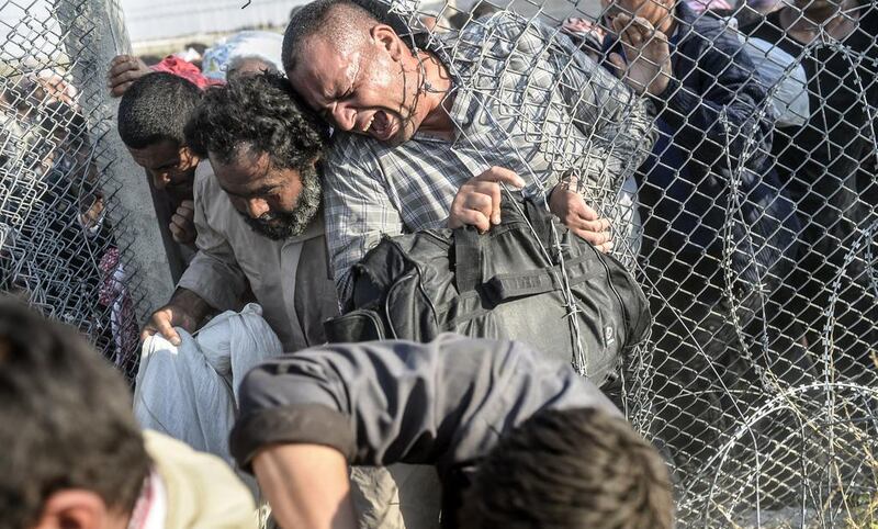 The decision came as Kurdish forces advanced on the ISIL-controlled town on Tal Abyad. Bulent Kilic/AFP Photo