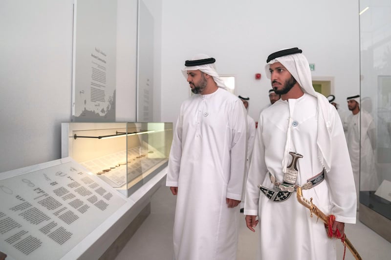 ABU DHABI, UNITED ARAB EMIRATES - December 05, 2018: HH Sheikh Theyab bin Mohamed bin Zayed Al Nahyan, Chairman of the Department of Transport, and Abu Dhabi Executive Council Member (L) and HH Sheikh Zayed bin Hamad bin Hamdan Al Nahyan (R), view a display in the Qasr Al Hosn exhibition and museum.

( Mohamed Al Hammadi / Ministry of Presidential Affairs )
---
