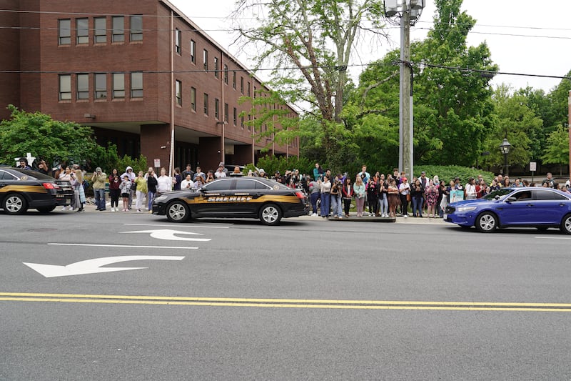 Police cars line the street outside the courthouse in Fairfax. Willy Lowry / The National