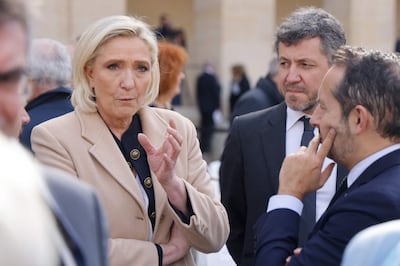 Marine Le Pen, left, has worked hard to detoxify her National Rally's image in hopes of becoming France’s first female president but there is inevitable concern about her ability to interact with Europe’s largest Muslim population. AFP