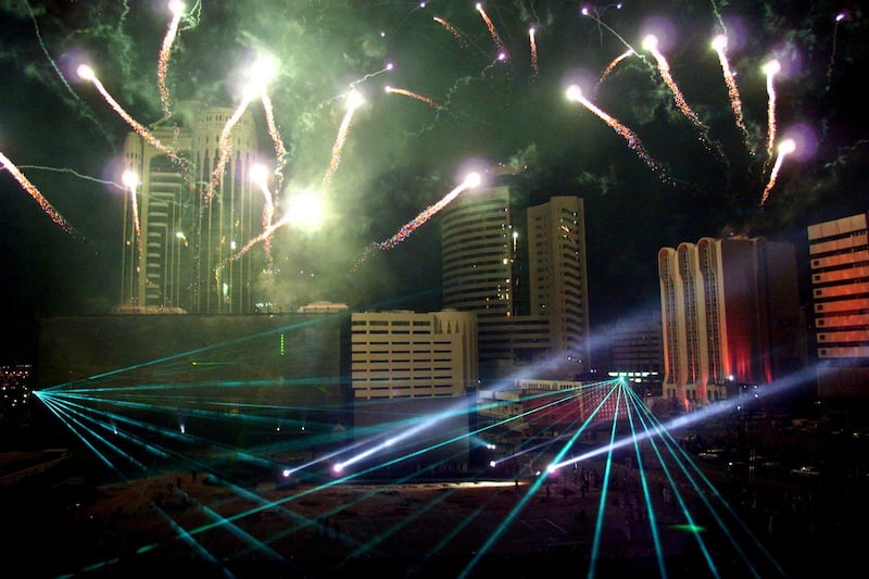 Fireworks and laser beams light the sky during the opening ceremony for Dubai Shopping Festival on March 18, 1999. AFP