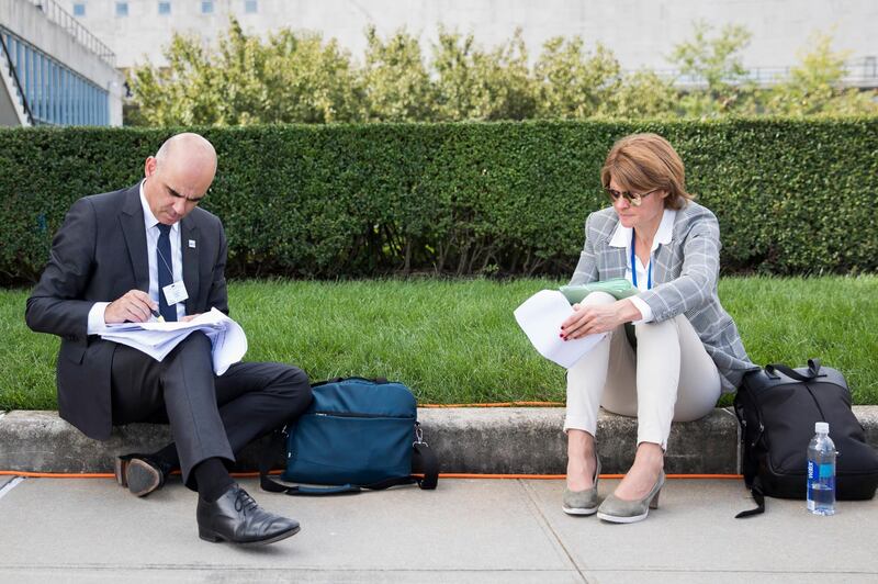 Swiss Federal President Alain Berset makes notes next to delegation member Veronique Haller (Counselor to the President) during a short break between bilateral meetings on the sidelines of the  General Assembly of the United Nations.  EPA