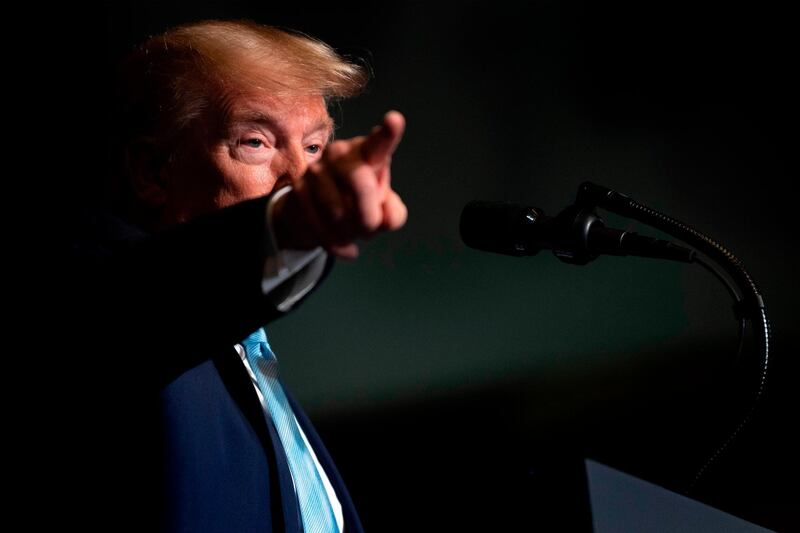 (FILES) In this file photo taken on January 3, 2020 US President Donald Trump speaks during a 'Evangelicals for Trump' campaign event held at the King Jesus International Ministry in Miami, Florida.  President Donald Trump thumbed his nose January 5, 2020 at critics angered at being kept in the dark over the US killing of a top Iranian general, saying he didn't need Congressional approval -- even for a "disproportionate" strike. House Speaker Nancy Pelosi has been leading the backlash against Trump's decision to authorize a drone strike against Qasem Soleimani in Baghdad, an operation that Trump only officially informed Congress about on Saturday -- nearly 48 hours after the event.
 / AFP / JIM WATSON

