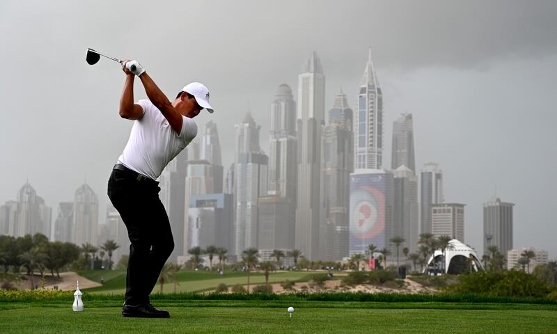 Ashun Wu of China tees off on the par four eighth hole during the final round of the Omega Dubai Desert Classic at Emirates Golf Club. Getty