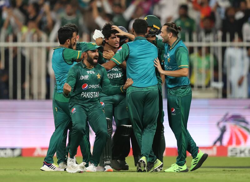 Pakistan players celebrate after Naseem Shah scored the winning runs.