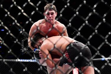 Darren Till, top, during his points win over Kelvin Gastelum at UFC 244 in November 2019. Getty Images