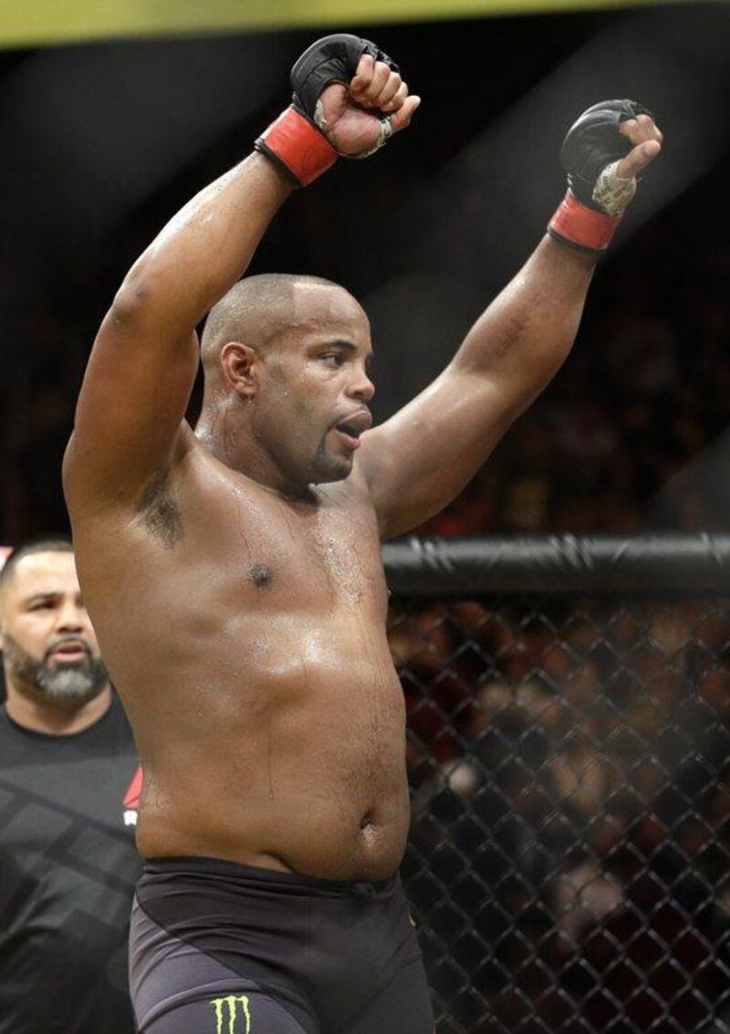 Daniel Cormier celebrates after defeating Anderson Silva during their light heavyweight bout at UFC 200, Saturday, July 9, 2016, in Las Vegas. John Locher / AP Photo