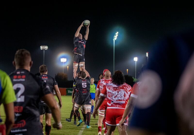 Matthew Mills of Dubai Exiles catches the ball at a line-out.