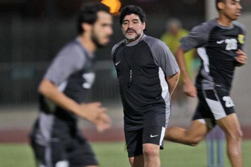 At 11.14 pm Saturday, Diego Maradona, centre, the Argentine football great, began the Al Wasl chapter of his football life.