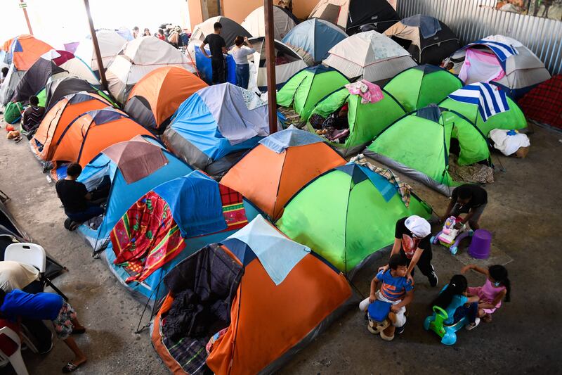 Migrants from Central and South America seeking asylum in the US camp out as Title 42 border restrictions continue. AFP