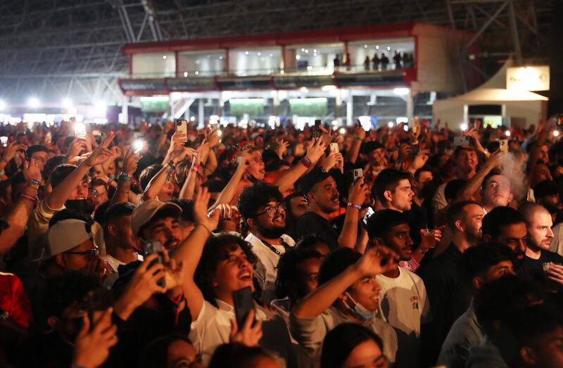 People enjoying the performance of DJ Martin Garrix during the F1 concert held at Etihad Park in Abu Dhabi. Pawan Singh/The National