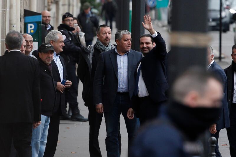 Saad Hariri waves to supporters as he arrives at his residence in Paris on November 18, 2017. Thibault Camus / AP Photo