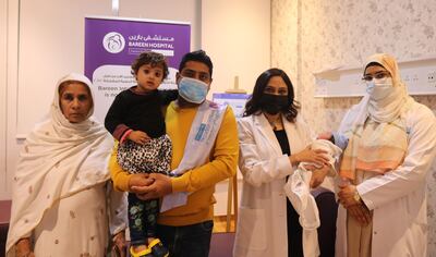 Baby Mohammed Hamdan Tanweer Ahmad with his grandmother,.father, sister and Dr Nazura Siddiqi who delivered the baby at NMC’s Bareen International Hospital in Abu Dhabi. Courtesy: NMC.