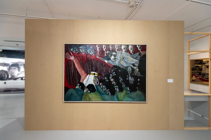 In the Politics section, works such as Aref El Rayess's The Changing of Horses (1967) depicting the Six-Day War explore the region's tumultuous political climate. Photo: Mathaf and Qatar Museums