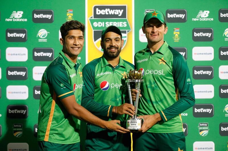 Pakistan' pacers Mohammad Hasnain, left, Haris Rauf, centre, and Shaheen Afridi with the ODI series trophy. AFP