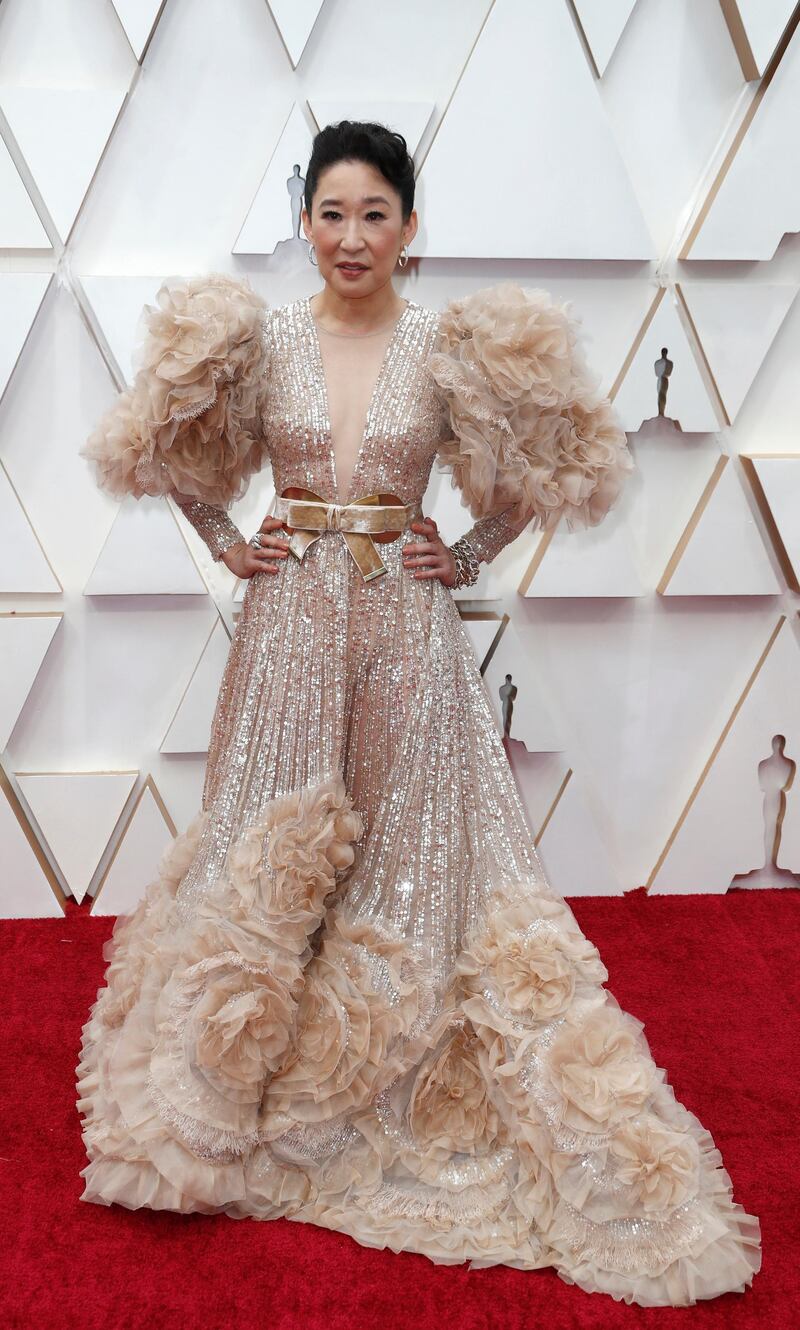Sandra Oh, wearing Elie Saab, poses on the red carpet during the 92nd Academy Awards in Hollywood on February 9, 2020. Reuters